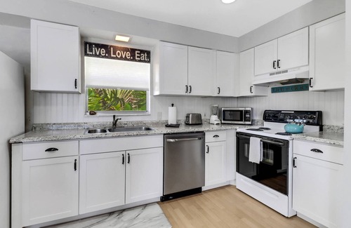 Bonita Bay Casa | Old Florida Waterfront Duplex! Close to Beach! Bikes, Kayak & Over $100 of Free Daily Activities!