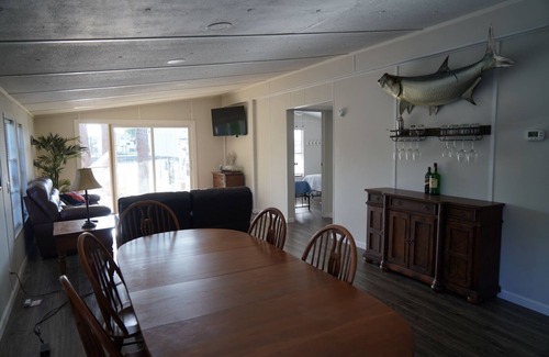 Suwannee Casa | Old Florida Waterfront Getaway - Large Porch, Big Dock, & Pet Friendly