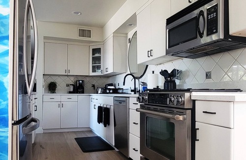 Southwest Village Casa | Old Town Scottsdale modern decor big pool hot tub TV on patio Comfort Convenient