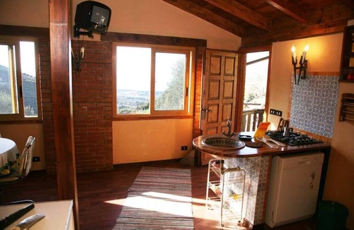 Capri Leone Cabina | CHALET ENTRE LOS ÁRBOLES DE OLIVA: wi-fi jardín barbacoa veranda maravilloso panorama