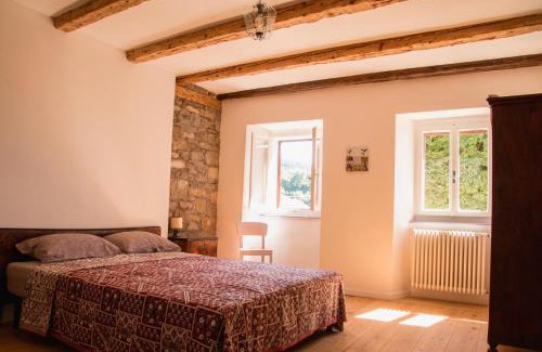 San Dorligo della Valle Casa | Oltre l'arco