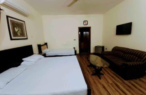 Johar Town Hotel | Omega Inn Hotel