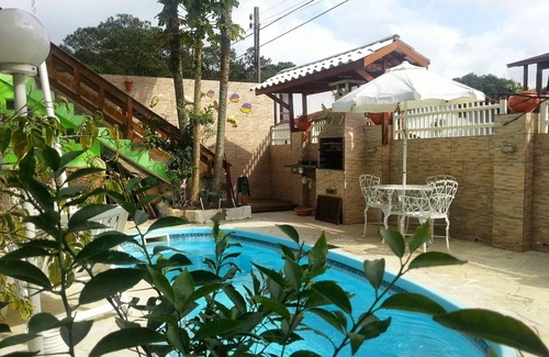 Barra da Lagoa Apartamento | apartamentos de una habitación con aire acondicionado, piscina y barbacoa en el patio