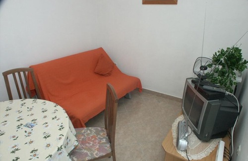 Zman Apartamento | One bedroom apartment with terrace and sea view Žman, Dugi otok (A-873-a)