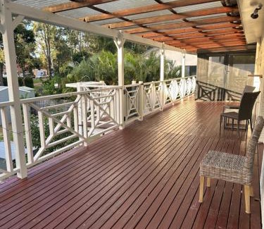 Gold Coast Casa | One bedroom with shared bathroom ground level of a two-story house