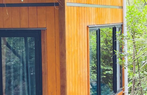 Sunshine Bay Casa | Ora° Retreat Tui Cabin Cozy Forest Escape