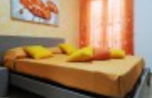 Caucana-finaiti-casuzze-finaiti Nord Apartamento | Apartamento naranja en los apartamentos Cocorito