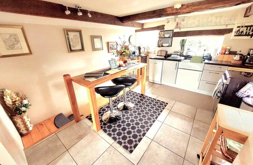 Newtownards Cabaña | Orchard Cottage granero conversión retiro romántico