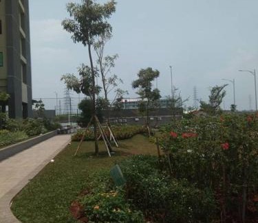 Java Apartamento | Osaka Riverview Apartment PIK2 dengan kolam renang, gym dan wifi.