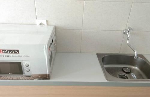 Java Apartamento | Osaka Riverview Apartment PIK2 dengan kolam renang, gym dan wifi.