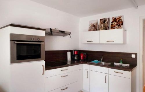 Warnemuende Apartamento | Ostseeoase mit Strandkorb am Meer