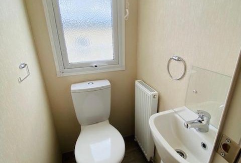 Grampound Casa | Our Osprey sleeps 4-6 persons-Tranquil holiday away from it all yet not far from St Austell- The Holiday Home has two bedrooms, living and dining area, equipped kitchen-decking-outdoor furniture-fishing lakes- This holiday home is not pet friendly