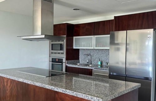 Jimenez Condominio | OV324N (2-Bedroom Condo) with Pool and Ocean view - Handicap accessible by RedAwning