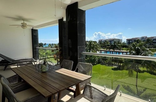 Jimenez Condominio | OV324N (2-Bedroom Condo) with Pool and Ocean view - Handicap accessible by RedAwning