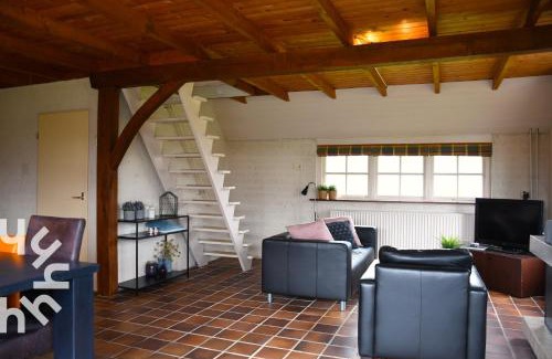 Ossenzijl Casa | OV606 - Beautifully located 6-person holiday home by the water with a large garden in Ossenzijl