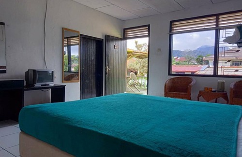 Berastagi Hotel | OYO 2322 Dien Karona Hotel