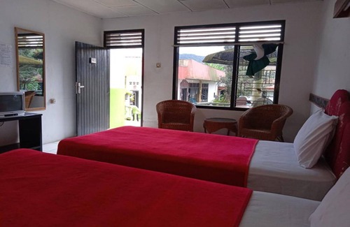 Berastagi Hotel | OYO 2322 Dien Karona Hotel