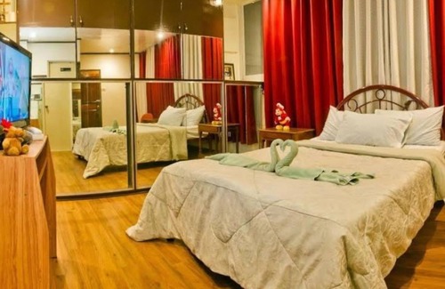 Puerto Princesa City Centre Hotel | OYO 880 Flores De Musa Inn