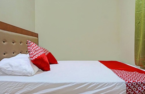 Makassar Hotel | OYO 91649 Orange Homestay Makassar