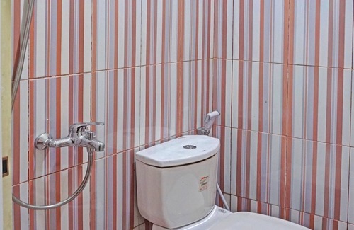 Makassar Hotel | OYO 91649 Orange Homestay Makassar
