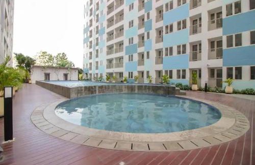 Karawang Hotel | OYO 93386 Apartemen Grand Sentraland by Mira