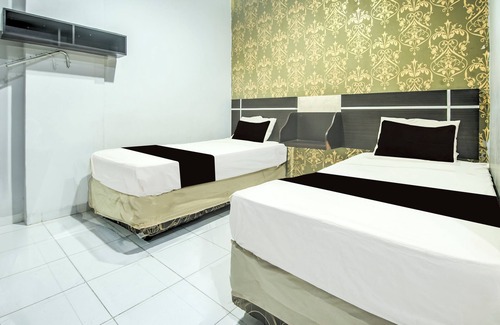 Panakkukang Hotel | OYO 94781 Hotel Lucky Inn Makassar