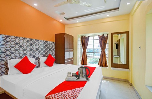 New Town Hotel | OYO Flagship 70092 The Golden Key