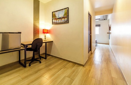 Americana Hotel | OYO Hotel Del Parque