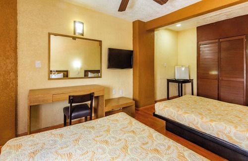 Americana Hotel | OYO Hotel Del Parque
