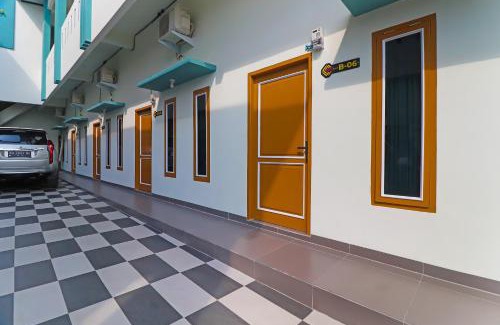 Jambi Hotel | OYO Life 92691 Mc Kost Syariah