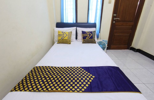 Muncan Hotel | OYO Life 93157 Kos Kaloka
