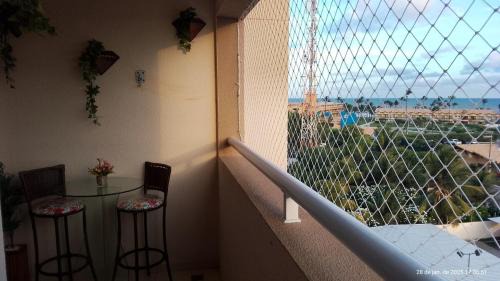 Barra dos Coqueiros Apartamento | Pé na areia e vista mar