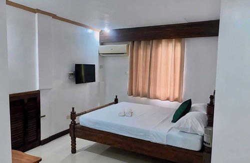 Puerto Princesa City Centre Hotel | Palawan-Rose Inn