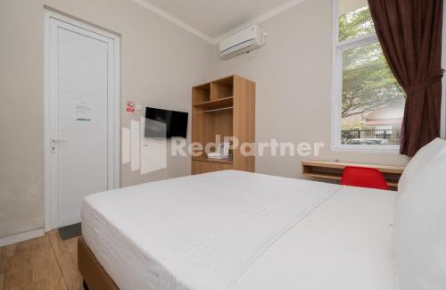 Jakarta Hotel | Palm Eight Mitra RedDoorz