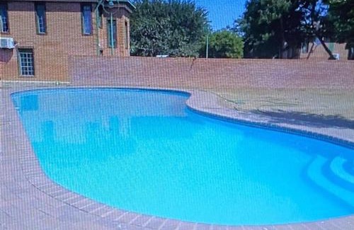 Gaborone Apartamento | Palm29 at Sunset Mews, Grand Palm - self catering appartment - Your Ideal Getaway for Work or Relaxation