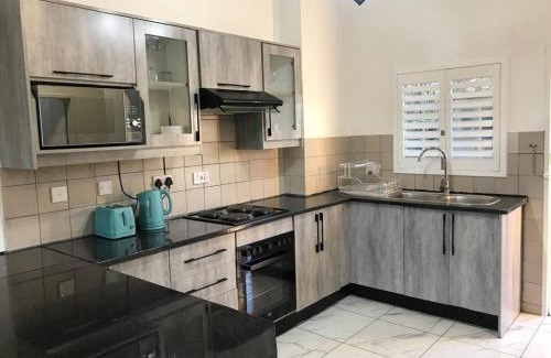 Gaborone Apartamento | Palm29 at Sunset Mews, Grand Palm - self catering appartment - Your Ideal Getaway for Work or Relaxation