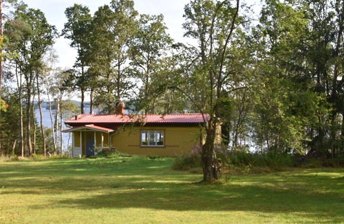 Sjuhult Casa | Cabaña Heavenly en el lago para los pescadores, piragüistas, excursionistas y ciclistas