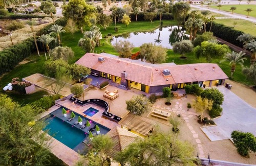 Palm Springs Casa | Paradiso by AvantStay Pool Lake Fire Pit Billiards Room Elegant Secluded Estate