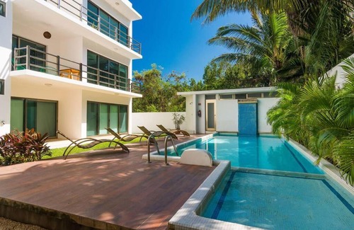 Villa Juarez Apartamento | Paraiso304; Luxury condo 3 min walk to the beach.