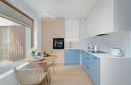 Grunwald Apartamento | Pastel Blue Studio Grunwald with Garden & Parking Poznań by Noclegi Renters