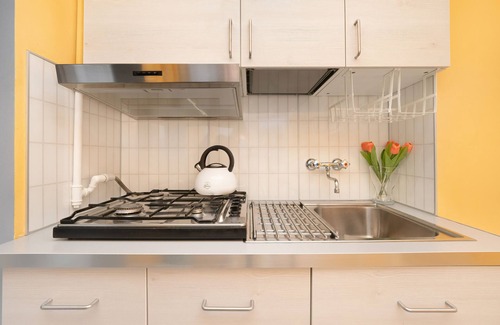 Baluty Apartamento | Pastel Blue Studio in Lodz by Renters