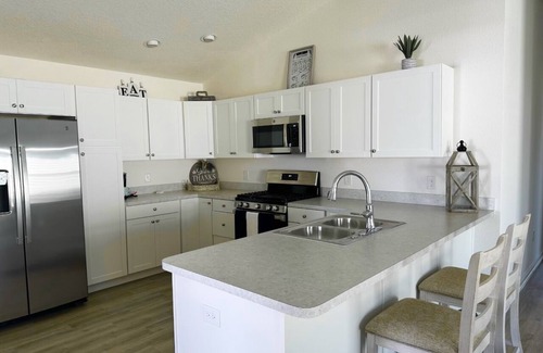 Okahumpka Casa | Patio Villa located right by SawGrass Grove and close to Brownwood Square!