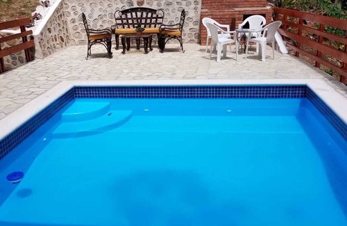 La Vega Province Villa | Cabina pacífica, en seguridad de los Alpes Dominicanos 24/7, clima muy agradable.