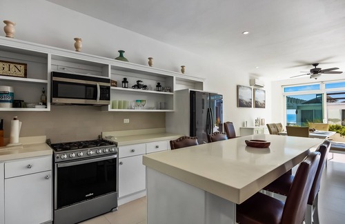 La Paloma Villa | Peaceful dog-friendly villa with outdoor pool, rooftop patio, beach views, & AC