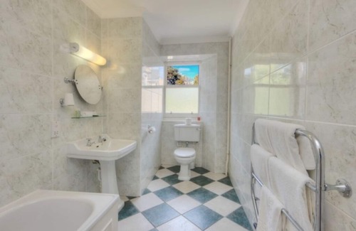 Nairn Hotel | Peaceful Retreat in Inverness: Elegant Room Amidst Lush Historical Gardens