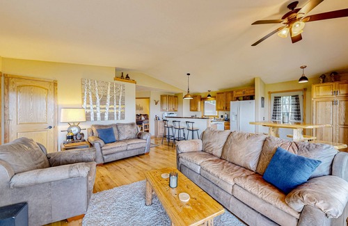 Wisconsin Dells Casa | Peaceful river view home with a furnished deck, firepit, central AC, & WiFi