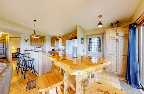 Wisconsin Dells Casa | Peaceful river view home with a furnished deck, firepit, central AC, & WiFi