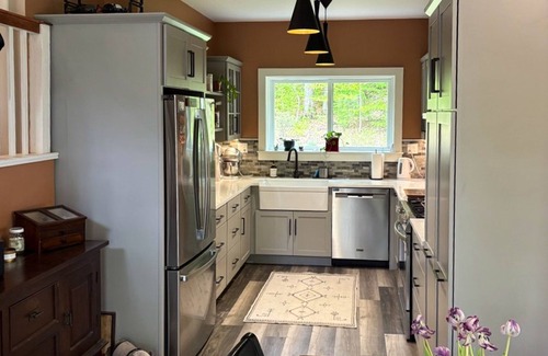 Newfane Casa | Peaceful riverfront house, dog-friendly, woodstove, decks, bbq, firepit, dock