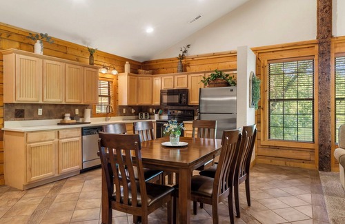 Branson Theater District Cabina | Peaceful Walk-in Cabin with Whirlpool Tub, Gas Fireplace, and Screened-in Porch