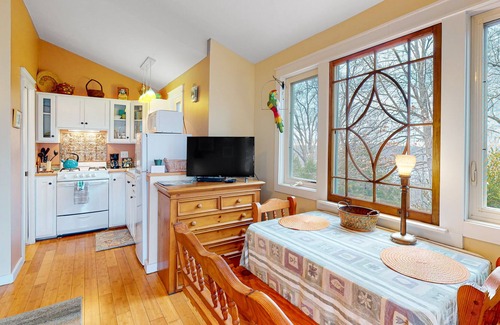 Sylvan Shores Cabaña | Peaceful wooded cottage with seasonal lake views, WiFi, private parking, & patio